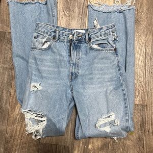 High waisted blue distressed jean